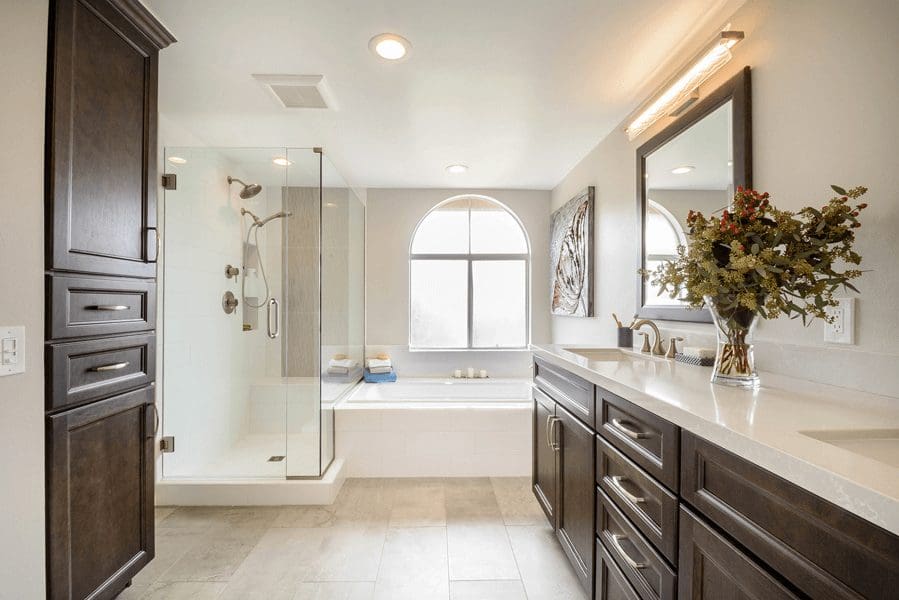 Large bathroom with bath tub and shower